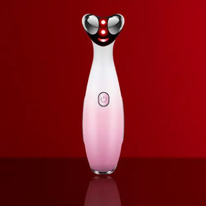 "RF eye massager with a sleek white and pink body, black rounded top, and three red LED lights, front view."