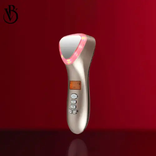 "Silver LED light therapy device with a mirror finish, colored lights around the top, and control buttons on the handle."