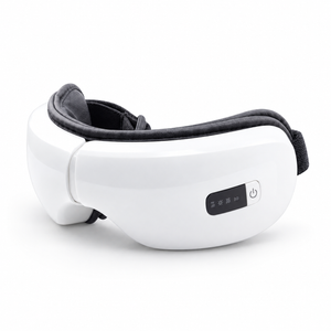 White and black electronic eye massager shown on a clean white background.