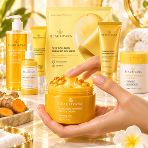 A hand holds a jar of Beautivana Roasted Turmeric Capsule Cream in the foreground, with several other Beautivana skincare products arranged behind it on a bright, decorative set. Visible products include a deep collagen turmeric gel mask, a roasted turmeric body wash, a turmeric night wrapping mask, and a turmeric clarifying facial pad.