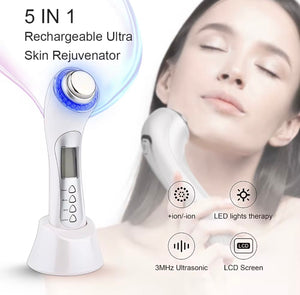 "White 5-in-1 ultrasonic facial device with LCD screen, blue light ring, and sleek ergonomic design, angled view"