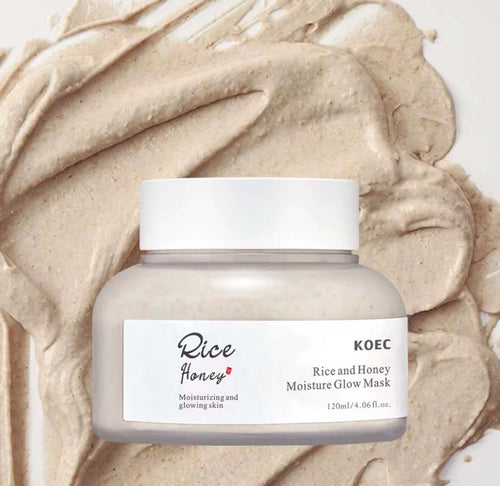 "White jar with a clear lid, filled with a light beige cream, placed on a beige textured background."