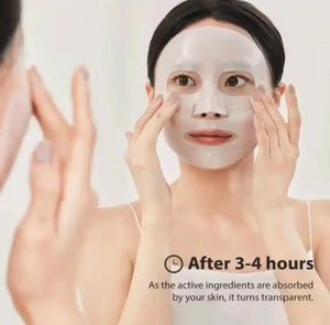 "Model applying a translucent collagen face mask, with a smooth, light complexion and dark hair, in a bright setting."