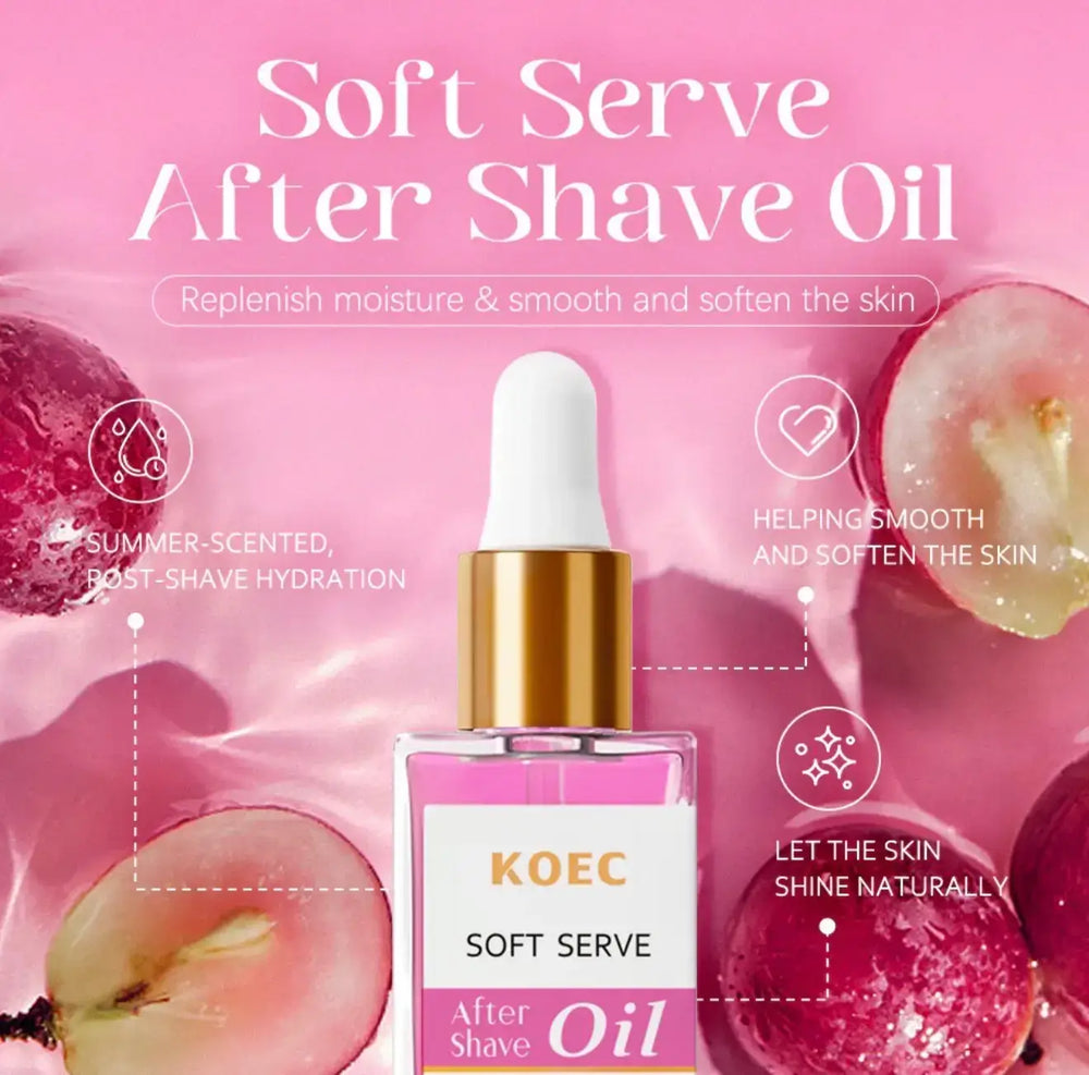 "KOEC Soft Serve After Shave Oil in a clear glass bottle with a pink label and gold cap, surrounded by fresh fruit slices."