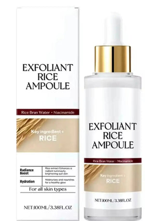 "White bottle of Exfoliant Rice Ampoule with dropper, surrounded by a tall white box featuring rice imagery, front view."