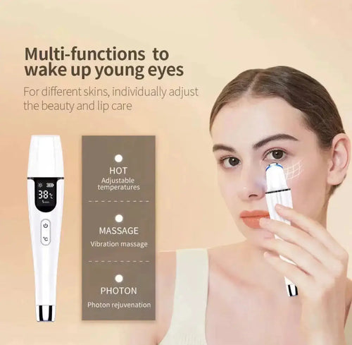 "White thermal ion eye massager with digital display and buttons, held next to a model's face, soft lighting."