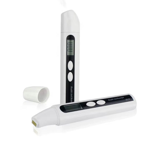Digital skin moisture analyzer shown upright and horizontal with protective cap