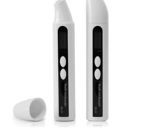 Handheld digital skin moisture analyzer with sensing probe and protective cap