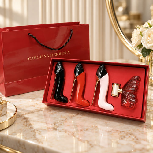 Luxury four-piece perfume gift set on marble vanity